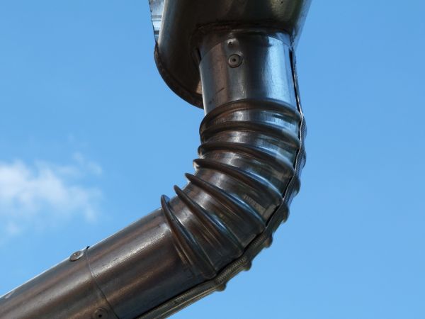 Metal Downspout Installation in Evergreen